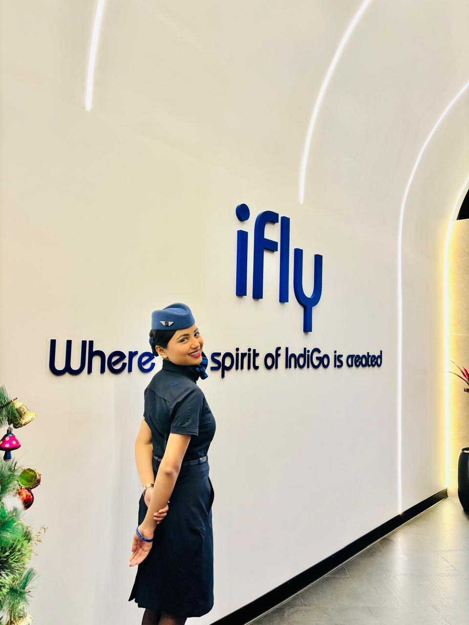 Cabin crew professional in uniform at an airline training centre